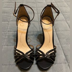 Black heels with gold studs